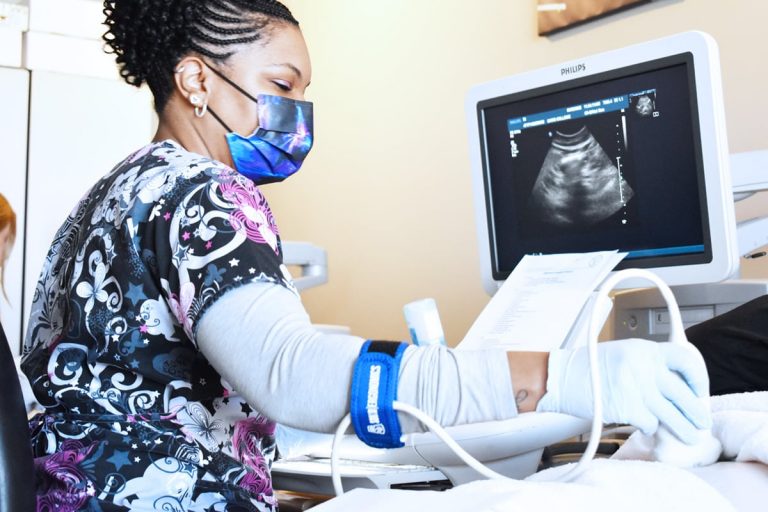 Cardiac Sonographer performing cardiac ultrasound
