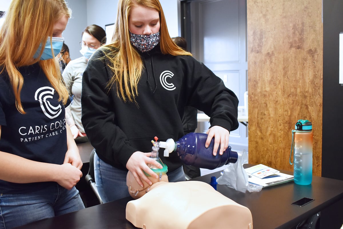 Caris College Cardiac Sonography student practicing skills