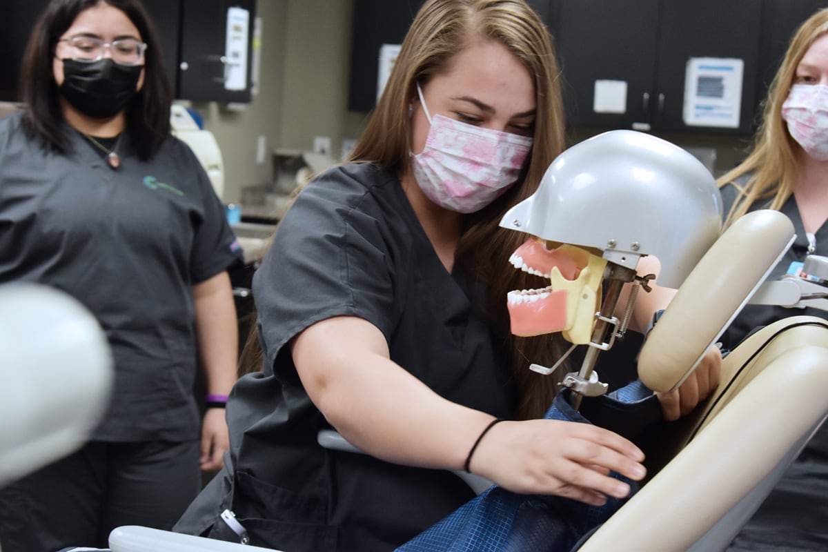 Dental Assisting student practicing in lab