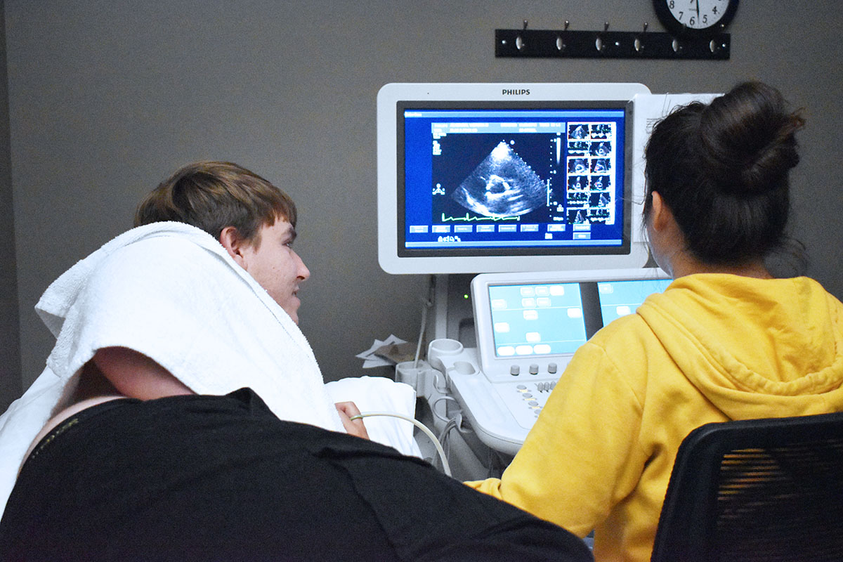 Cardiac Sonography students reviewing exam